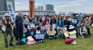 People protest in support of Japan’s pacifist constitution in Tokyo on Sunday 3 May