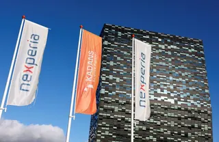 Flags flutter in front of the headquarters of Nexperia in Nijmegen, the Netherlands, January 14 2026. Photo: Reuters