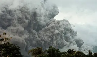 Thick clouds of ash from Mayon are seen from Daraga, Albay province, Philippines on Saturday. Photo: AP