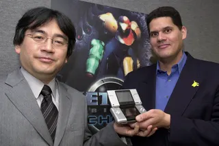 A photo of the late Nintendo president Satoru Iwata and Reggie Fils-Aimé, former president of Nintendo of America, at E3 in 2004