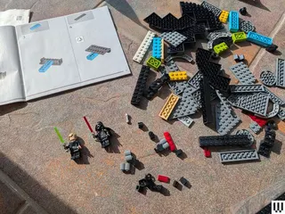 Image may contain Toy Baby Person and Lego Set