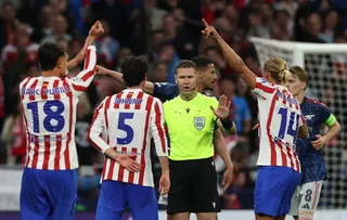 Atletico Madrid players claim a hand ball before referee Danny Makkelie awards a penalty to the team at Riyadh Air Metropolitano on April 29, 2026. — Reuters pic