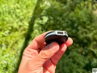 Image may contain: Body Part, Finger, Hand, Person, Electronics, Mobile Phone, Phone, Hockey, Ice Hockey, and Ice Hockey Puck