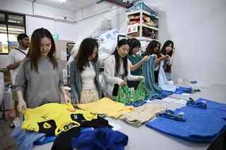 Participants can have a hand in sorting through donated items at Cloop’s sorting facility.