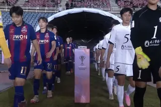 South Korea’s Suwon FC Women and North Korea’s Naegohyang Women’s FC walk onto the pitch ahead of their Asian Football Confederation Women’s Champions League group stage match in Myanmar in November. Photo: YouTube/The AFC Hub