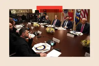 Getty Images Zelenksy and Trump and officials sat round a wooden table in the White House