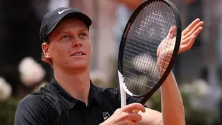 Jannik Sinner applauds the crowd after reaching the Italian Open semi-finals