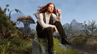 ABK sitting on a rock, with Morrowind behind him