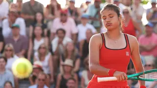 Emma Raducanu sighs as she watches the ball go past her for a winner at the 2026 French Open
