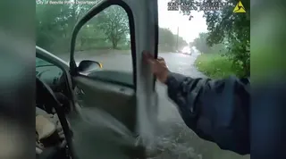 Video captures dramatic rescue of baby from vehicle trapped in Texas floodwaters