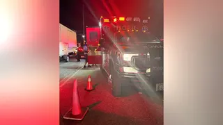 Ambulance is seen after nineteen people were injured early Sunday in an apparent stampede