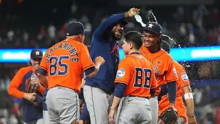 Alimber Santa being doused with water after pitching in major league debut