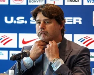 Mauricio Pochettino speaks at a microphone during the announcement of the US roster.