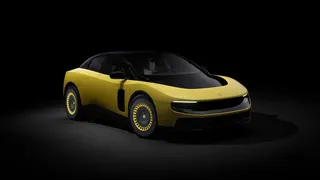 Image may contain Machine Wheel Car Transportation Vehicle Alloy Wheel Car Wheel Spoke Tire and Sports Car