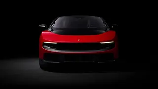 Image may contain Car Transportation Vehicle Sedan Sports Car and Coupe