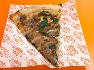 Tender Japanese Wagyu grade A5 with a slight sweet flavour is the highlight of this pizza.