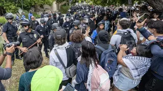 Anti-Israel protesters being pushed back by police on UCLA campus