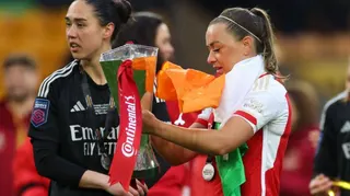 Arsenal players celebrating winning the League Cup
