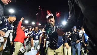 Ole Miss head coach Pete Golding being doused with water by players at Vaught-Hemingway Stadium