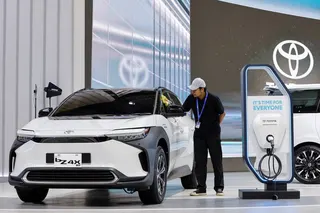 Toyota's bZ4X electric vehicle at an international car show in Indonesia in August 2023. At 10% of Japan’s economy, the automotive industry is a pillar of the nation.