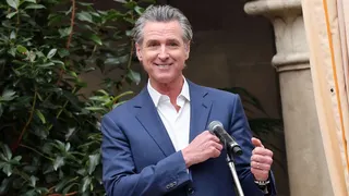 gavin newsom outside smiling