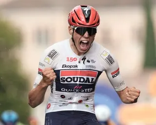 France's Paul Magnier Soudal Quick-Step roars over the line at Pieve di Soligo