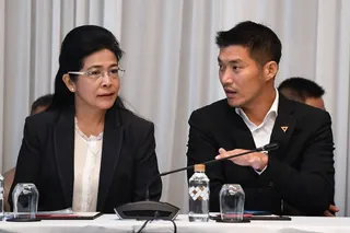 Pheu Thai party leader Sudarat Keyuraphan (left) listens to Future Forward Party leader Thanathorn Juangroongruangkit during a joint press conference in Bangkok March 27, 2019. — AFP file pic