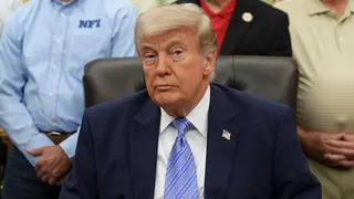 President Donald Trump standing in the Oval Office at the White House