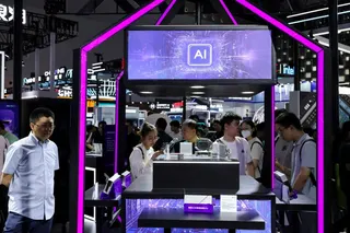People visit a Metax booth during the World Artificial Intelligence Conference in Shanghai. Photo: Reuters