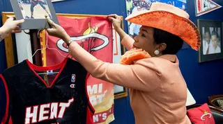 Rep. Frederica Wilson, D-Fla., adjusting Miami Heat merch