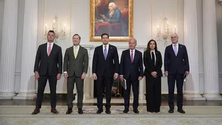 Michael Needham, Mike Waltz, Marco Rubio, Michel Issa, Nada Hamadeh Moawad, and Yechiel Leiter standing in a row inside the State Department