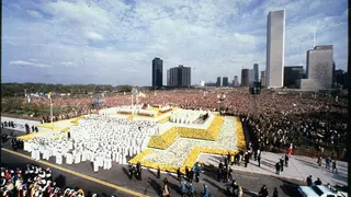 Pope John Paul II stands on top of a four-level terraced altar during a celebration of mass in Grant Park before an estimated crowd of 1.5 million people.