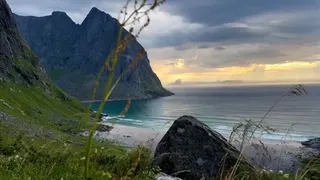 This is a screenshot of an Instagram video published on August 12, 2025. It was taken on the Kvalvika beach hike, one of the popular tours in the Lofoten Islands, Norway.