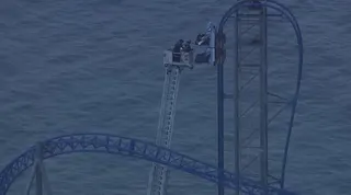 Roller coaster riders rescued after being stranded more than 3 hours above Texas amusement park