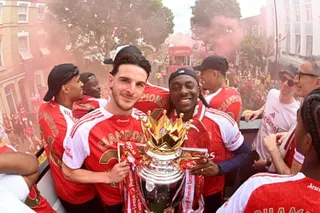 Declan Rice and Eberechi Eze pose with the Premier League trophy during Arsenal’s trophy parade