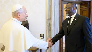 Pope Leo XIV shakes hand with Chicago's Democratic mayor Brandon Johnson in The Vatican
