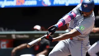 Jesus Sanchez hitting a single during a baseball game at Oriole Park at Camden Yards