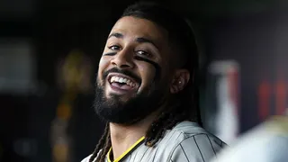 San Diego Padres' Fernando Tatis Jr. celebrating after hitting a home run during a baseball game.