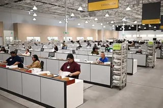 Ballots are inspected at the LA County Ballot Processing Center during Tuesday’s election.