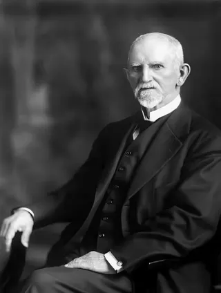 A black and white image of Frank Rule