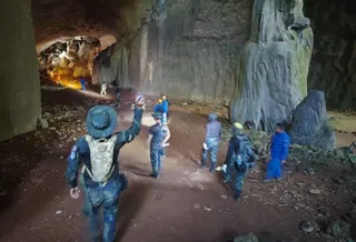 Rescuers in search of the victim, Ismail Ibrahim, who was last seen by two friends who had entered the cave with him on Tuesday (May 26). — Picture from Facebook/Lahad Datu info