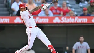 Jordyn Adams hitting a baseball during a game at Angel Stadium of Anaheim