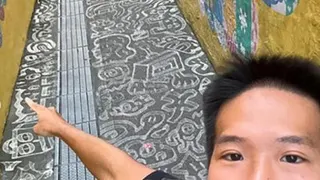 方章杰用高压水枪"画画"。