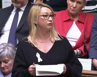 MP Jess Asato holds papers while speaking in the House of Commons