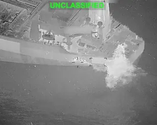 Screenshot from US Central Command of a Hellfire missile fired at a tanker attempting to break through the American blockade of the strait of Hormuz amid crisis in Iran.