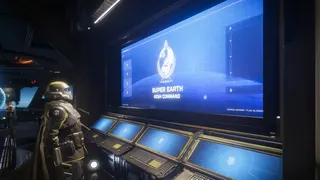 A helldiver looking at a transmission from Super Earth high command in Helldivers 2.