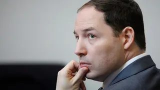 Brendan Banfield listening during a trial in Fairfax County Circuit Court