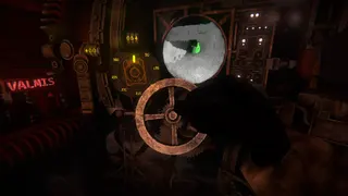 A view of a player's hand turning a wheel to operate a radar of some kind in the tank simulator Carcass Clad.