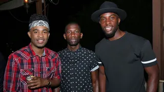 Musician Elijah Blake, producer Shama Joseph, and musician Talay Riley posing at a party in West Hollywood