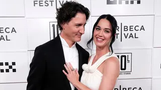 Justin Trudeau and Katy Perry standing together at the OKX Theater in New York